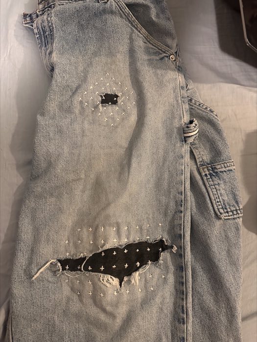 Large hole in the knee of a pair of jeans
